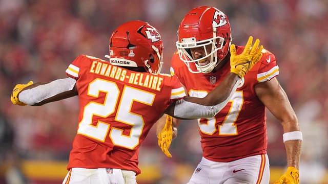 Oct 10, 2022; Kansas City, Missouri, USA; Kansas City Chiefs tight end Travis Kelce (87) celebrates a touchdown with running back Clyde Edwards-Helaire (25) at GEHA Field at Arrowhead Stadium.