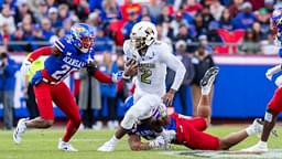 Kansas City, Missouri, USA; Colorado quarterback Shedeur Sanders (2) scrambles for yardage during the 2nd quarter between the Kansas Jayhawks and the Colorado Buffaloes at GEHA Field at Arrowhead Stadium.