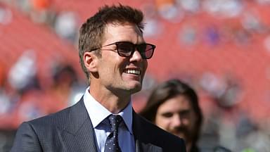 NFL legend Tom Brady is all smiles before an NFL football game at Huntington Bank Field, Sunday, Sept. 8, 2024, in Cleveland, Ohio.