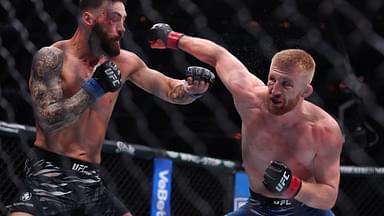 New York, NY, USA; Bo Nickal (red gloves) fights Paul Craig in the middleweight bout during UFC 309 at Madison Square Garden.