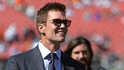 NFL legend Tom Brady is all smiles before an NFL football game at Huntington Bank Field,