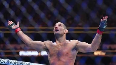 Sean Strickland (red gloves)celebrates defeating Paulo Costa (blue gloves) during UFC 302 at Prudential Center.