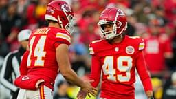 Kansas City Chiefs place kicker Matthew Wright (49) celebrates with punter Matt Araiza (14) after kicking a field goal during the second half against the Las Vegas Raiders at GEHA Field at Arrowhead Stadium.