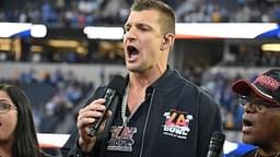 Rob Gronkowski (middle) sings the during the National Anthem with the New Directions Veterans Choir before the Starco Brands LA Bowl at SoFi Stadium. Gronkowski is the host of the game.