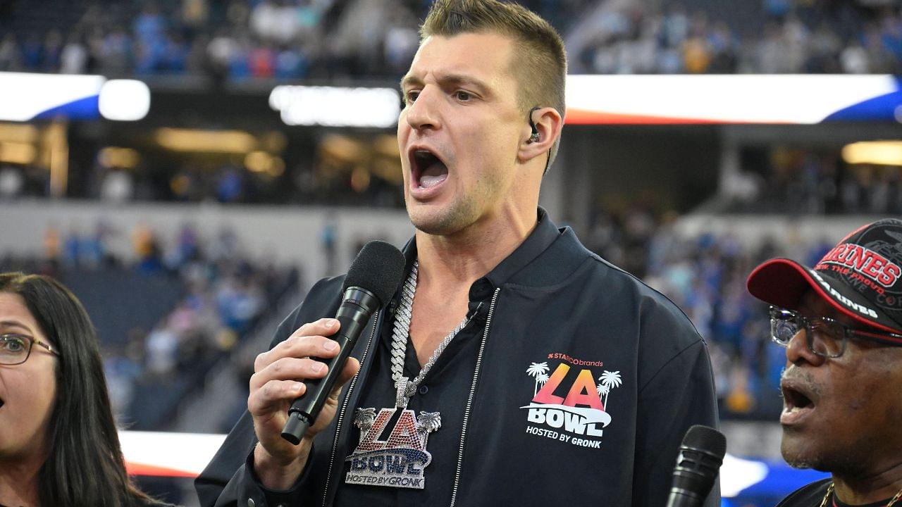 Rob Gronkowski (middle) sings the during the National Anthem with the New Directions Veterans Choir before the Starco Brands LA Bowl at SoFi Stadium. Gronkowski is the host of the game.