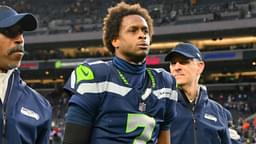 Dec 22, 2024; Seattle, Washington, USA; Seattle Seahawks quarterback Geno Smith (7) walks off the field after the game against the Minnesota Vikings at Lumen Field.