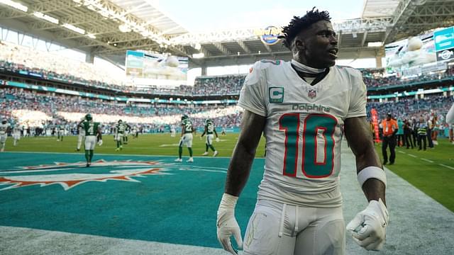 Miami Dolphins wide receiver Tyreek Hill (10) celebrates after defeating the New York Jets during overtime at Hard Rock Stadium.