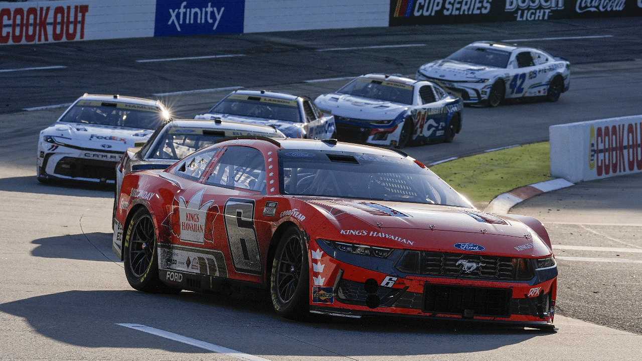 NASCAR Cup Series driver Brad Keselowski (6) leads the field out of turn two during the Xfinity 500 at Martinsville Speedway.