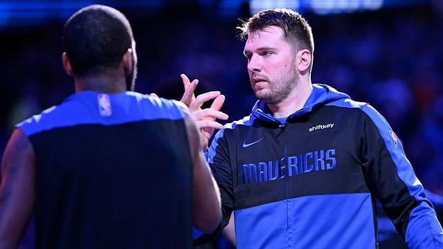 Dallas Mavericks guard Kyrie Irving (11) greets guard Luka Doncic (77) before the game against the Minnesota Timberwolves at the American Airlines Center.