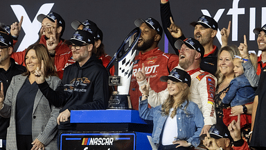 NASCAR Xfinity Series team owner Dale Earnhardt Jr and sister Kelley Earnhardt Miller celebrate with driver Justin Allgaier after winning the 2024 Xfinity Series championship during the Championship race at Phoenix Raceway.