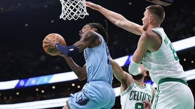 Memphis Grizzlies guard Ja Morant (12) shoots during the second half against the Boston Celtics at TD Garden.