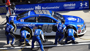 NASCAR Sprint Cup Series driver Dale Earnhardt Jr. (88) makes a pit stop during the Daytona 500 at Daytona International Speedway.