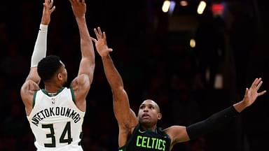 Milwaukee Bucks forward Giannis Antetokounmpo (34) shoot the ball over Boston Celtics center Al Horford (42) during the second half at TD Garden.