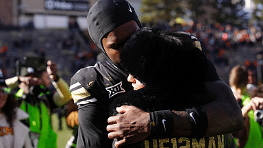 Colorado Buffaloes wide receiver Travis Hunter (12) hugs his girl friend following the win against the Oklahoma State Cowboys at Folsom Field.