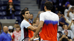 Carlos Alcaraz (ESP) (L) shakes hands with Marin Cilic (CRO) (R) after their match on day eight of the 2022 U.S. Open