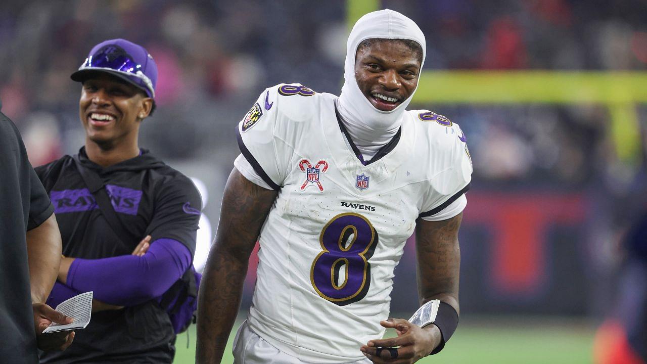 Baltimore Ravens quarterback Lamar Jackson (8) smiles during the fourth quarter against the Houston Texans at NRG Stadium.