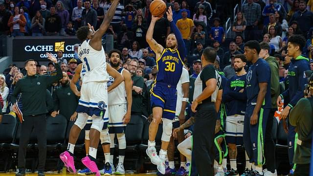 Golden State Warriors guard Stephen Curry (30) attempts to tie the game with a three point shot with two seconds left in the game against Minnesota Timberwolves guard Anthony Edwards (1) during the fourth quarter at Chase Center