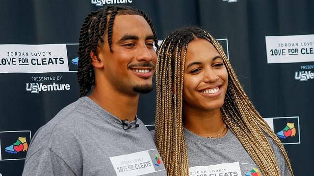 Green Bay Packers quarterback Jordan Love and his fiancée, Ronika Stone, pose for a photo on Monday, August 26, 2024, at Green Bay West High School in Green Bay, Wis. Love’s foundation, Hands of 10ve, is partnering with U.S. Venture to give youth football teams a set of new cleats for each touchdown Love runs or throws for in the 2024 season. Teams will be able to apply for cleats in December, and cleats will be given to teams based on need.