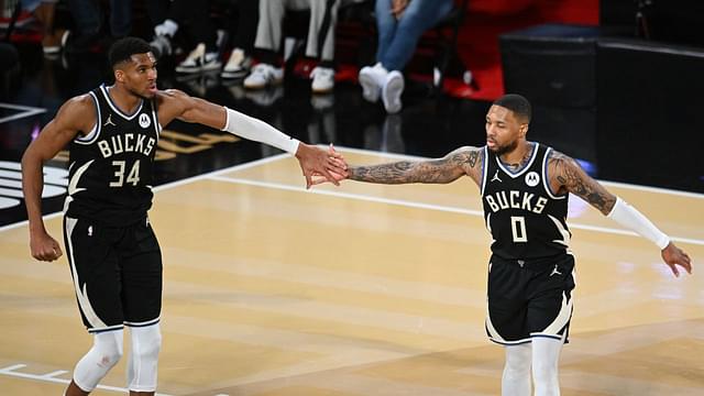 Milwaukee Bucks guard Damian Lillard (0) and forward Giannis Antetokounmpo (34) react during the fourth quarter against the Atlanta Hawks in a semifinal of the 2024 Emirates NBA Cup at T-Mobile Arena.