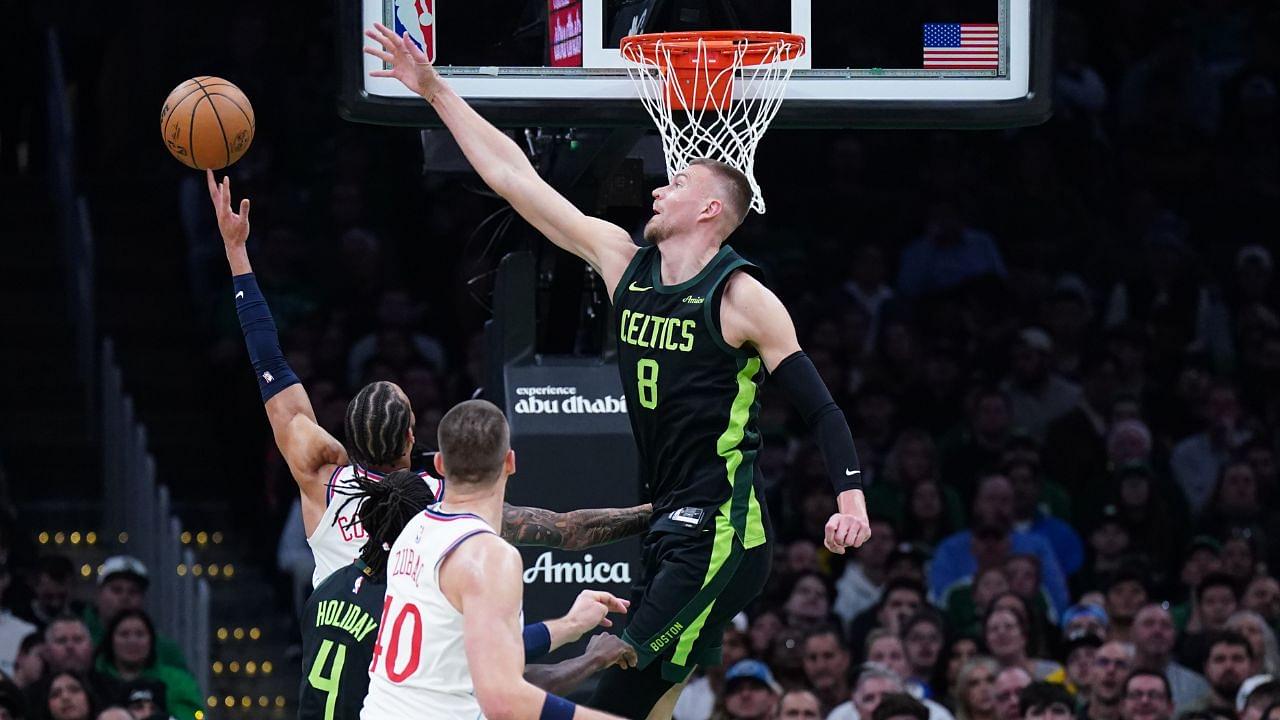 Boston Celtics center Kristaps Porzingis (8) defends against LA Clippers guard Amir Coffey (7) in the first quarter at TD Garden.