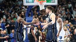 Dallas Mavericks guard Kyrie Irving (11) celebrates with Dallas Mavericks guard Luka Doncic (77) during the fourth quarter against the Memphis Grizzlies at American Airlines Center.