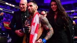 Ilia Topuria celebrates his championship victory against Alexander Volkanovski during UFC 298 at Honda Center.