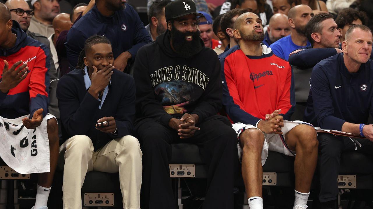 LA Clippers guard James Harden (center) on the bench during the second quarter against the Houston Rockets at Intuit Dome