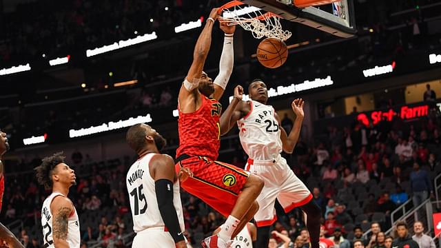 Atlanta Hawks forward Vince Carter (15) scores his 25,000 point in the NBA on a dunk on the final play of the game against the Toronto Raptors during the second half at State Farm Arena