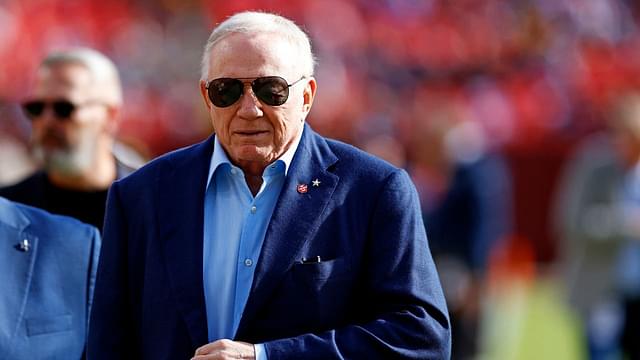 Dallas Cowboys owner Jerry Jones walks off the field before the game between the Washington Commanders and the Dallas Cowboys at Northwest Stadium.