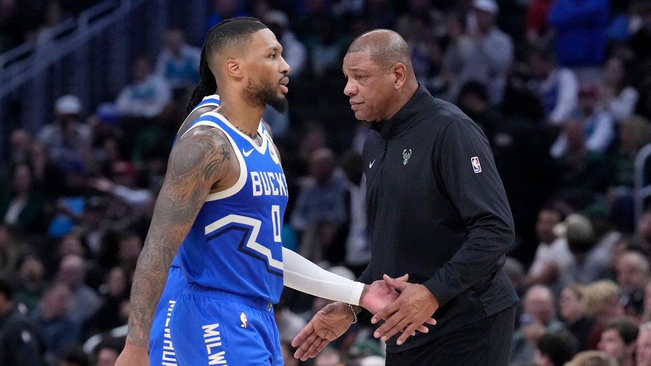 Milwaukee Bucks head coach Doc Rivers congratulates Milwaukee Bucks guard Damian Lillard (0) in the second half at Fiserv Forum.