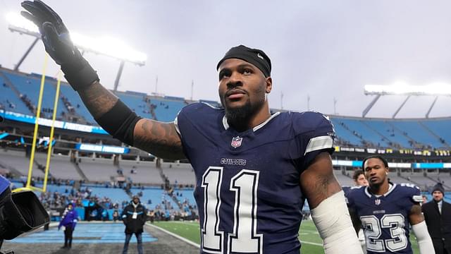 Dallas Cowboys linebacker Micah Parsons (11) walks off the field after the game at Bank of America Stadium.