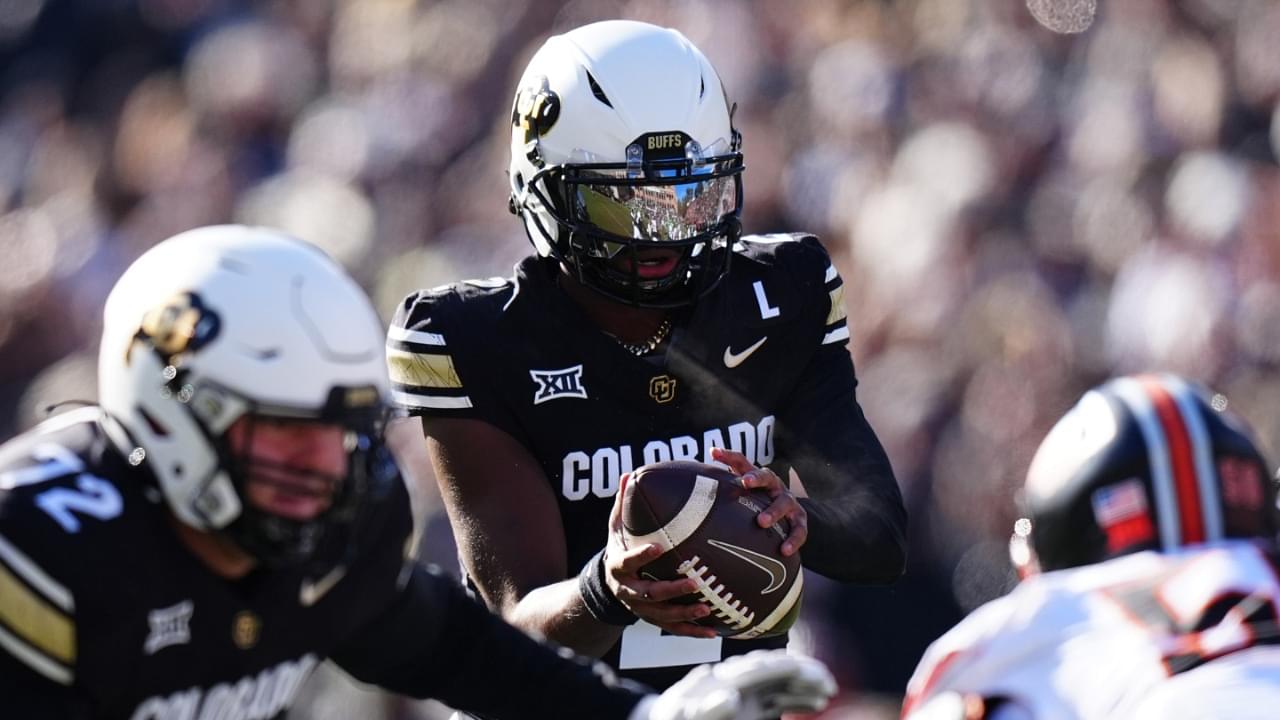 Nov 29, 2024; Boulder, Colorado, USA; Colorado Buffaloes quarterback Shedeur Sanders (2) takes a hike in the first quarter against the Oklahoma State Cowboys at Folsom Field.