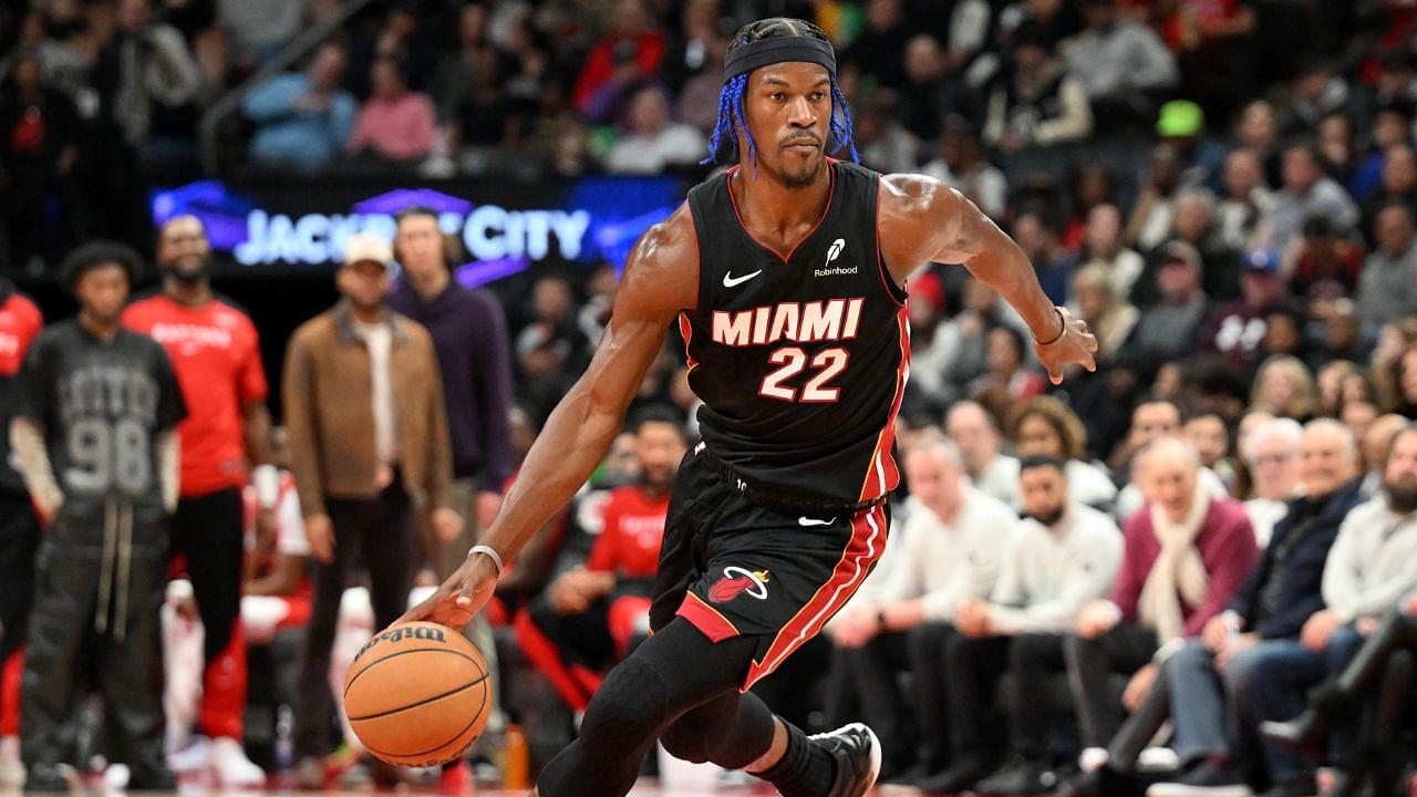 Miami Heat forward Jimmy Butler (22) dribbles the ball against the Toronto Raptors in the first half at Scotiabank Arena