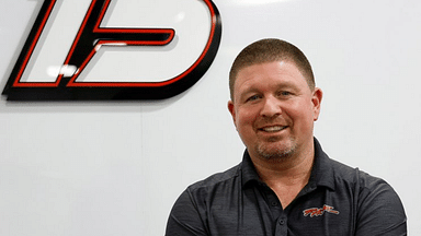 Rick Ware Racing employee and winningest driver at Bowman Gray Stadium, Tim Brown.