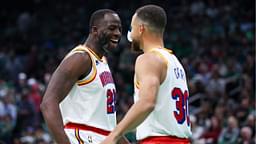 Golden State Warriors forward Draymond Green (23) and Golden State Warriors guard Stephen Curry (30) celebrate during the first half against the Boston Celtics at TD Garden.