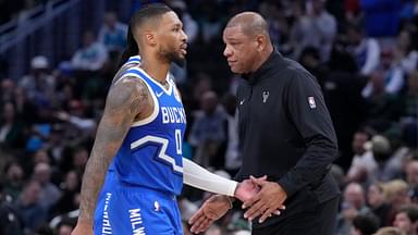 Milwaukee Bucks head coach Doc Rivers congratulates Milwaukee Bucks guard Damian Lillard (0) in the second half at Fiserv Forum.