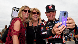 Monster Energy NASCAR Cup Series driver Clint Bowyer (right) poses for a selfie with fans during qualifying for the Alabama 500 at Talladega Superspeedway.