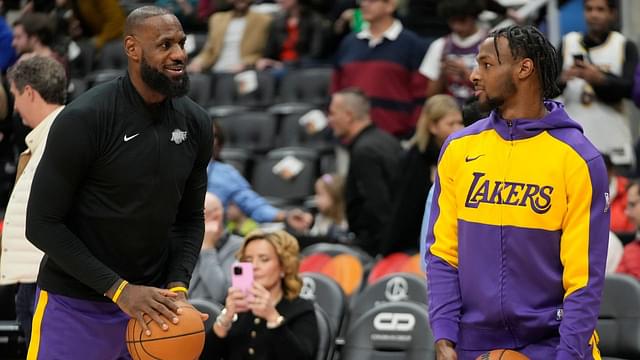 Los Angeles Lakers forward LeBron James (left) and guard Bronny James (right) during warm up before a game agaonst the Toronto Raptors at Scotiabank Arena.