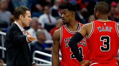 Chicago Bulls head coach Fred Hoiberg talks with Chicago Bulls forward Jimmy Butler (21) and guard Dwyane Wade (3) during the second quarter at Amway Center.