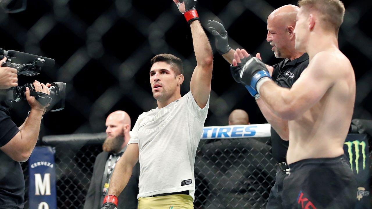 Vincent Luque (red gloves) defeats Derrick Krantz (blue gloves) during UFC Fight Night at Blue Cross Arena.