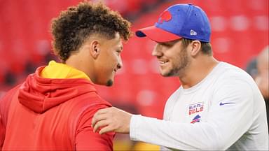 Kansas City Chiefs quarterback Patrick Mahomes (15) talks with Buffalo Bills quarterback Josh Allen (17) before warm ups at GEHA Field at Arrowhead Stadium.