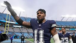 Dallas Cowboys linebacker Micah Parsons (11) walks off the field after the game at Bank of America Stadium.