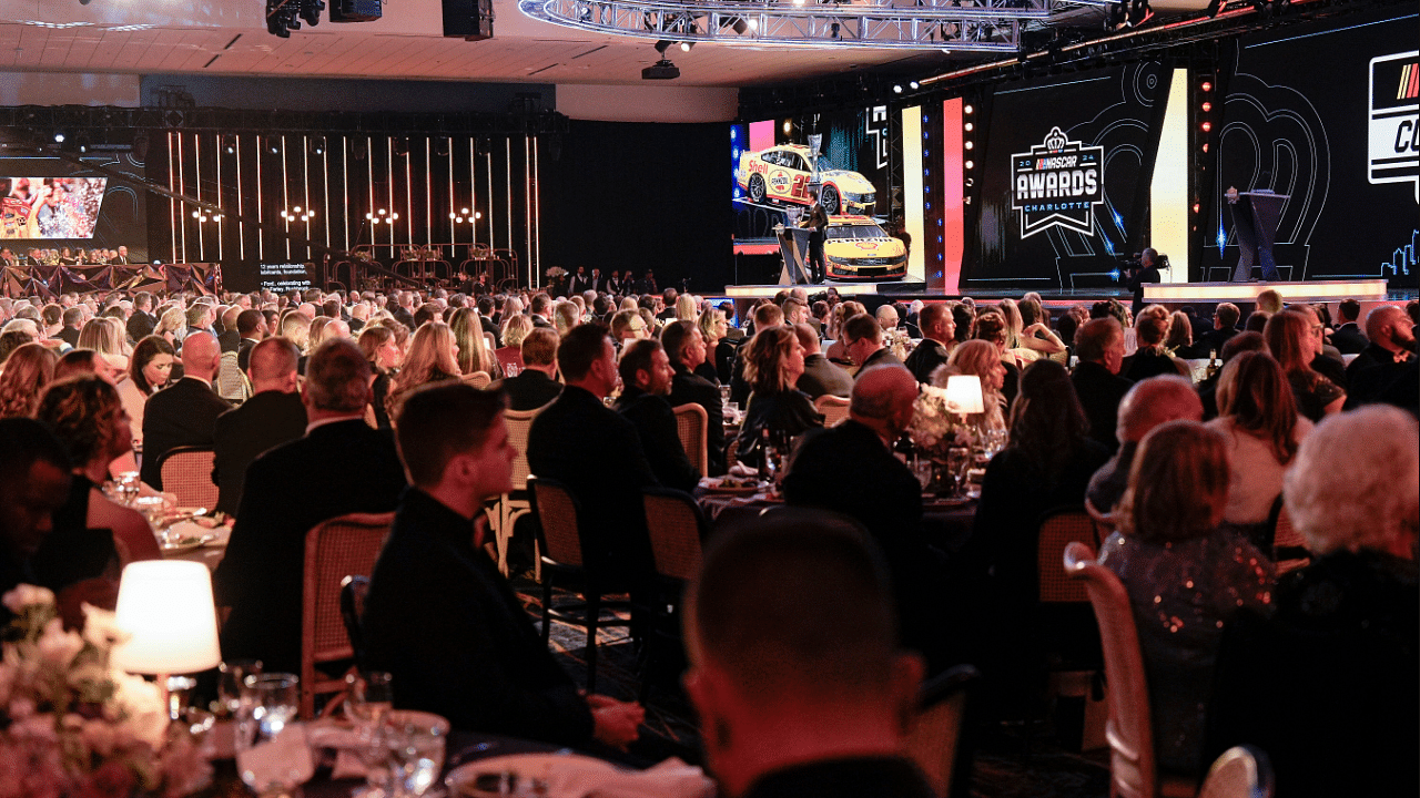 NASCAR Cup Series driver Joey Logano (22) talks to the audience during the NASCAR Awards Banquet at Charlotte Convention Center.