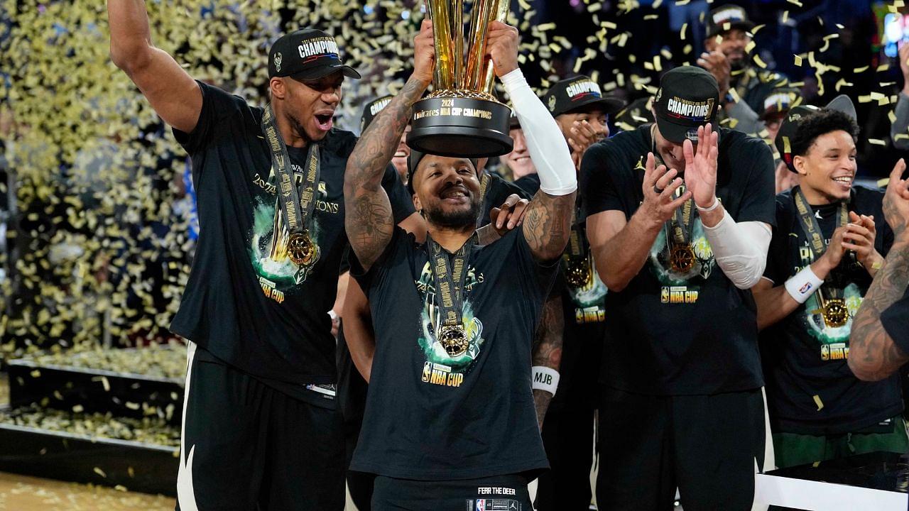 Milwaukee Bucks forward Giannis Antetokounmpo (34), guard Damian Lillard (0) and center Brook Lopez (11) celebrate after winning the Emirates NBA Cup championship game against the Oklahoma City Thunder at T-Mobile Arena.