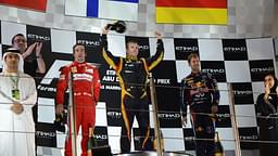 Podium: Kimi Räikkönen (FIN) Lotus F1 Team E20 (race winner), Fernando Alonso (ESP) Scuderia Ferrari F2012 (2nd position) and Sebastian Vettel (GER) Red Bull Racing RB8 (3rd position) 2012 Abu Dhabi Grand Prix