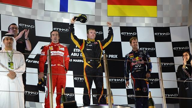 Podium: Kimi Räikkönen (FIN) Lotus F1 Team E20 (race winner), Fernando Alonso (ESP) Scuderia Ferrari F2012 (2nd position) and Sebastian Vettel (GER) Red Bull Racing RB8 (3rd position) 2012 Abu Dhabi Grand Prix