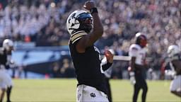 Colorado Buffaloes quarterback Shedeur Sanders (2) celebrates a third quarter touchdown pass against the Oklahoma State Cowboys at Folsom Field.