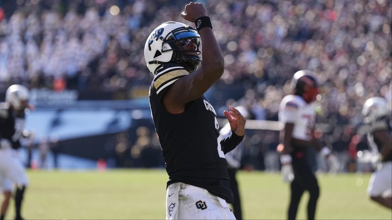 Colorado Buffaloes quarterback Shedeur Sanders (2) celebrates a third quarter touchdown pass against the Oklahoma State Cowboys at Folsom Field.