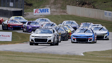 The pace car leads the cars during a caution flag during the NASCAR Kwik Trip 250, Sunday, July 3, 2022, at Elkhart Lake's Road America near Elkhart Lake, Wis.