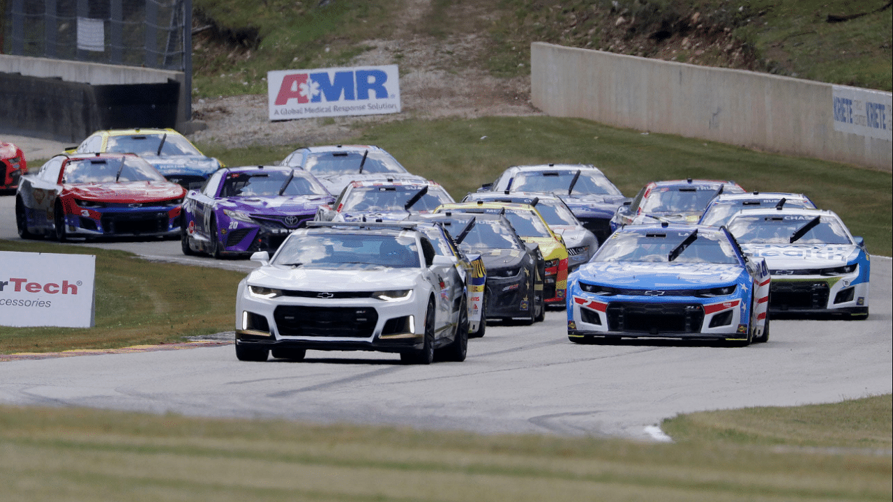 The pace car leads the cars during a caution flag during the NASCAR Kwik Trip 250, Sunday, July 3, 2022, at Elkhart Lake's Road America near Elkhart Lake, Wis.